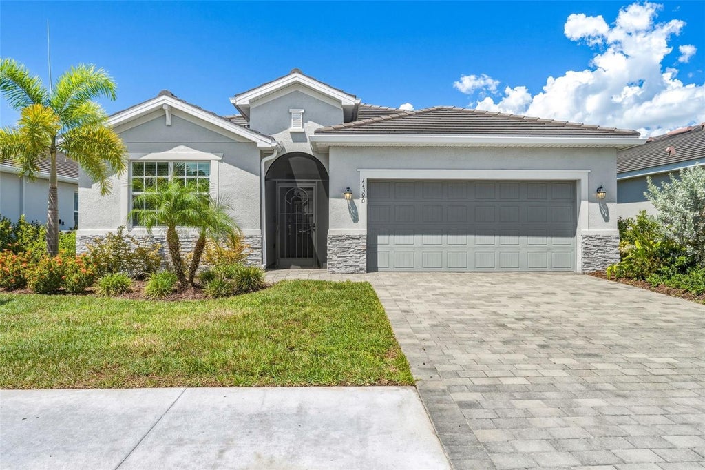 Photo of 11390 Burgundy Drive, Venice, FL 34293 (MLS # N6145531)