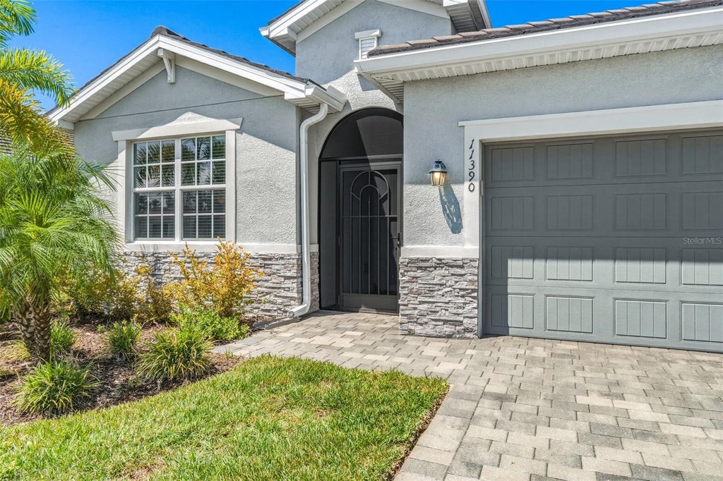 Photo of 11390 Burgundy Drive, Venice, FL 34293 (MLS # N6145531)