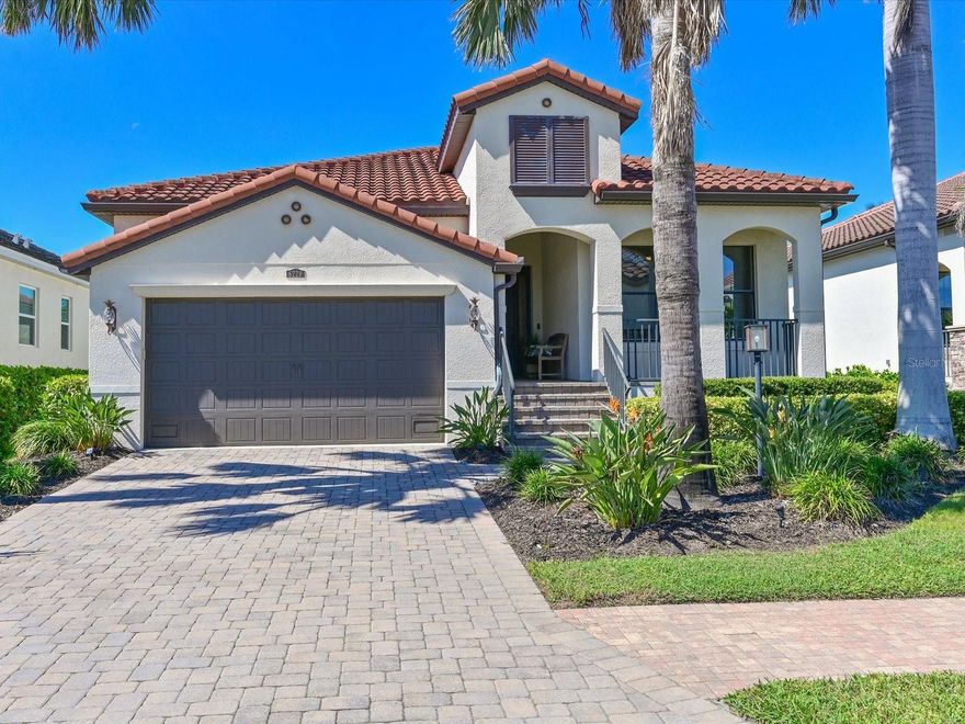 GREAT NEW OPPORTUNITY IN LEGENDS BAY!.  Exceptionally maintained one owner home has had no renters.  This 4 bedroom 2 1/2 bath home boasts many decorator touches and upgrades. Enter into the spacious foyer with custom light fixtures, tray ceiling with crown molding and designer wall finishes. 18" ceramic tile flooring guides you into the spacious gathering area consisting of the great room, living room and kitchen.  The gourmet kitchen has everything an aspiring chef could need.  Stainless steel appliances include a three-door refrigerator/freezer with dual ice output, built-in microwave and oven, 5 burner gas stove and new LG dishwasher.  Wood cabinetry offers plenty of storage with easy to use pull out drawers and soft close features. The large corner pantry has solid wood slat shelving. Diana Reale marble countertops and travertine backsplash adorn this area.  The kitchen island offers casual seating for up to four. The dining area is optimal for more formal meals; two large windows offer light and views to the outdoor area. The spacious great room is perfect for larger gatherings or just relaxing watching TV.
Enter the primary bedroom with ensuite bath consisting of large vanity with dual sinks, soaking tub and huge walk-in shower.  A separate toilet room and walk-in closet complete this private area in the rear of the home.
This split floorplan has two guestrooms and full bath with tub/shower combo on one side of home, making these perfect for family or guests.
The fourth bedroom is currently used as an office and has engineered hardwood floors. A separate half bath is conveniently located for guest use. 
Save the best for last:  Walk out to your private custom designed lanai and pool area.   The covered lanai with travertine tile flooring boasts a large seating space to relax and unwind with friends and family.  A custom outdoor kitchen has marine grade polymer cabinetry with drawers and pull-out shelves to store everything you need to create an outdoor meal.  A Hestan commercial grade stainless steel grill with built-in rotisserie and infra-red burner can cook just about anything you desire including pizzas.  The kitchen also includes 2 gas side burners, an outdoor beverage refrigerator and granite countertop and backsplash.
Relax and unwind in the custom designed concrete (not Gunite) pool with waterfall fountain and a sun shelf for relaxing and viewing sunsets or native Florida birds in the small creek behind the home. 
Florida friendly landscaping surrounds all sides of the home and is watered with recycled water for irrigation provided in the HOA fee. Automated 12volt landscape lighting highlights the home and palms in the evening.
Legends Bay is a gated community located along Sarasota Bay. Enjoy local activities in Bradenton and Sarasota.  Legends Bay is located just ten minutes from Sarasota International Airport and 55 minutes to Tampa International Airport.  World renown IMG Academy campus is 3 miles nearby and IMG Golf Course is a golf cart ride away. Explore Downtown Bradenton with its historic charm and the Manatee riverfront or venture south to Downtown Sarasota with fine dining, exciting venues such as the Van Wezel Performing Center and Sarasota Opera House and the well-loved St. Armand's Circle. Check out local activities and markets along the crystal sand beaches of Bradenton Beach and Anna Maria Island.   Every day holds an adventure within minutes of your new home!