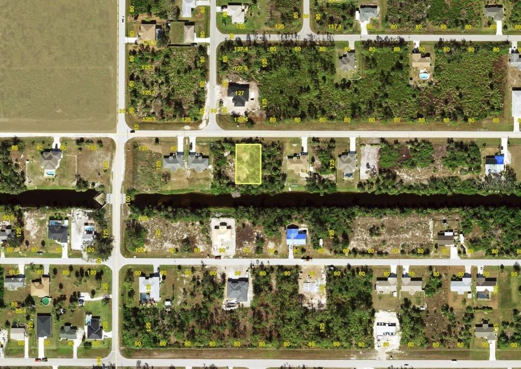 Photo of 12043 Foresman Boulevard, Port Charlotte, FL 33981 (MLS # A4683149)