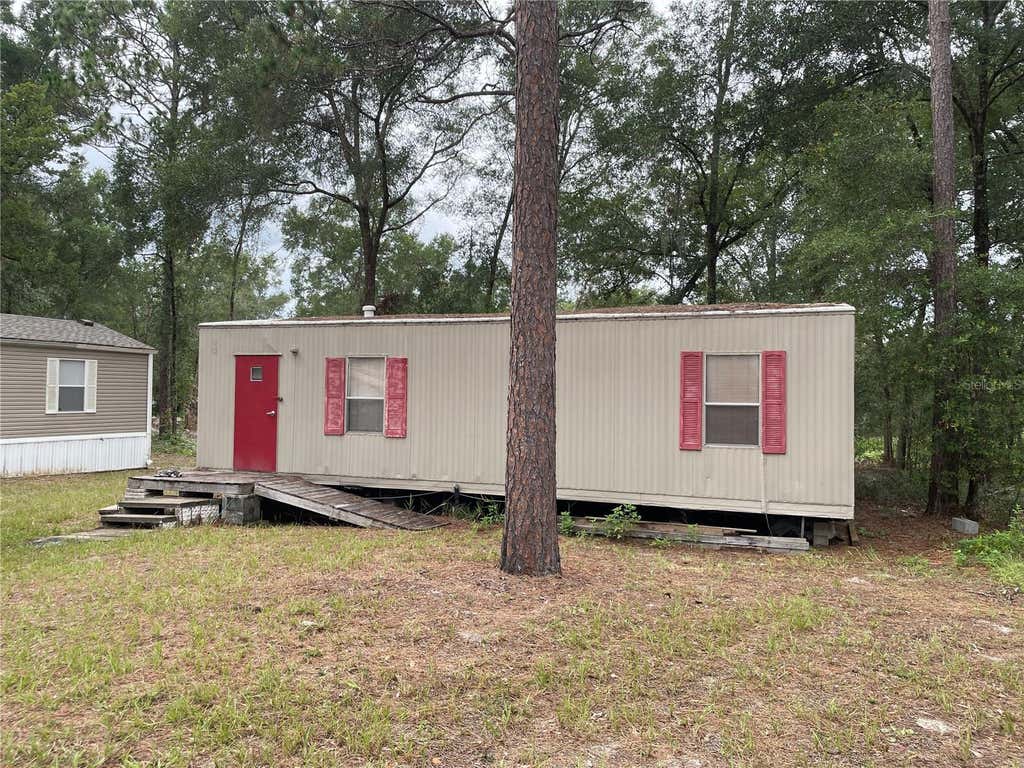 Photo of 8089 SW 147th Lane, Dunnellon, FL 34432 (MLS # OM729816)