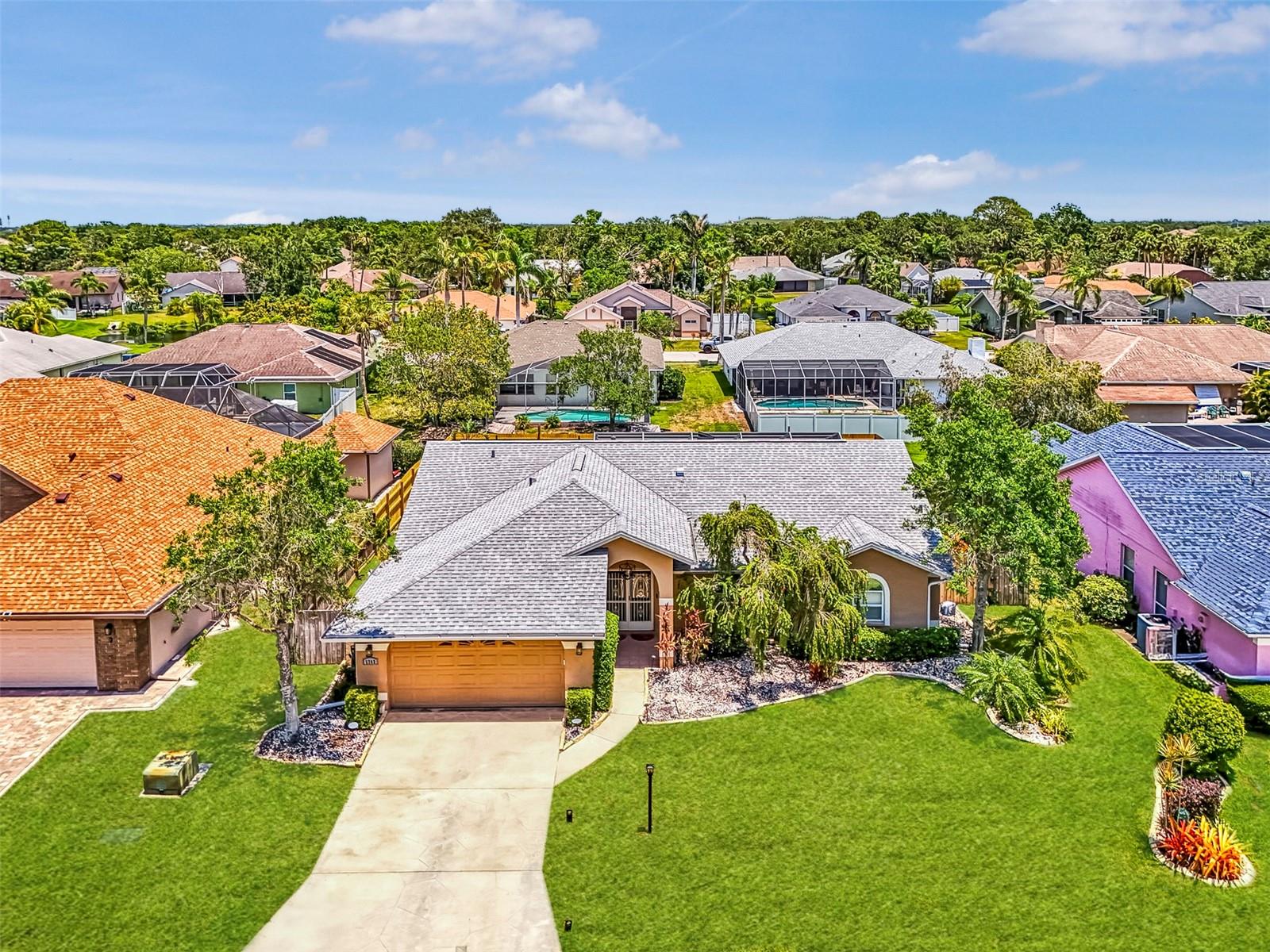 One or more photo(s) has been virtually staged. Welcome to your next chapter in a thoughtfully maintained 3-bedroom, 2-bath saltwater pool home nestled in a peaceful and inviting Bradenton community. From the moment you step inside, you're greeted with wall-to-wall luxury vinyl flooring, providing a seamless blend of style and durability throughout the open, split floorplan.
The heart of the home is the spacious eat-in kitchen, featuring upgraded appliances and a breakfast bar perfect for both quick coffee breaks and weekend pancake feasts. Adjacent is a generous living space that flows effortlessly to the screened lanai, where your private outdoor kitchen awaits. Outfitted with a stainless steel grill, refrigerator, and ample storage, it's ready for anything from burger nights to birthday bashes.
The expansive primary bedroom offers a serene retreat, complete with a custom ensuite bath that boasts dual sinks and granite countertops. Two additional bedrooms ensure ample space for family, guests, or that home office you’ve been dreaming of.
Step outside to a sparkling saltwater pool framed by a fully fenced yard—ideal for peaceful evenings or splash-filled afternoons. The backyard feels like your own private resort, minus the room service.
New roof installed in 2023 and a new HVAC installed in 2021.
Located in a quiet enclave of only 102 homes, this community enjoys easy access to shopping, dining, parks, and some of the most beautiful beaches Florida has to offer. Whether you're upsizing, downsizing, or rightsizing, this home is just the right fit for comfortable living and effortless entertaining. Come see it for yourself—there’s no substitute for finding the perfect place to call home.