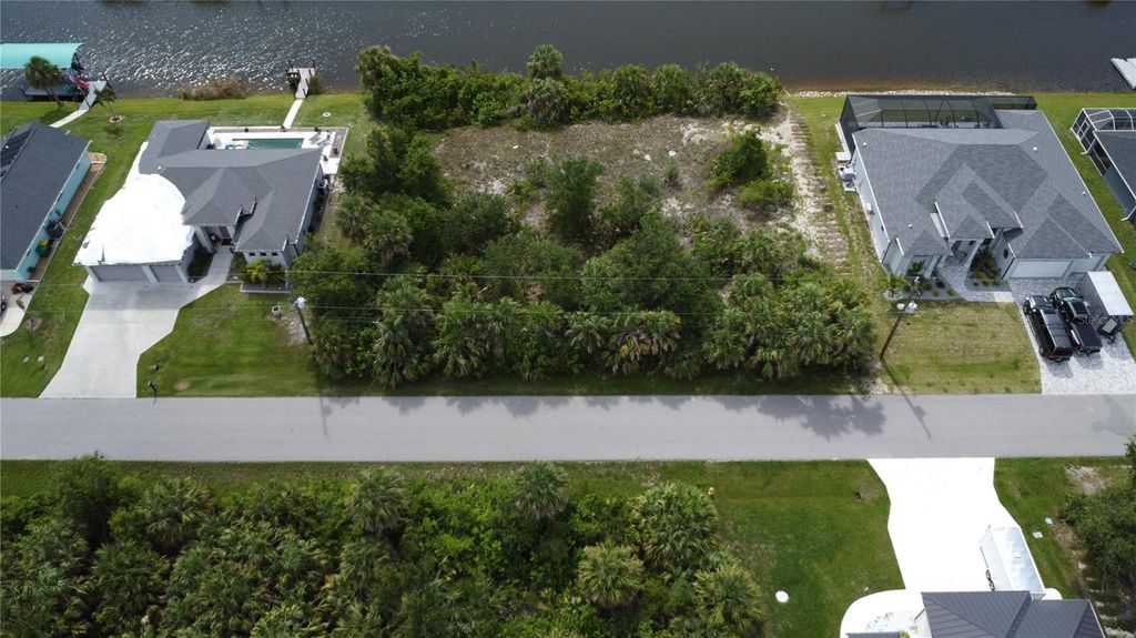 Photo of 9494 Impala Circle, Port Charlotte, FL 33981 (MLS # O6318476)