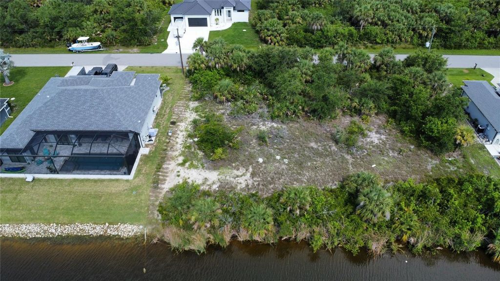 Photo of 9494 Impala Circle, Port Charlotte, FL 33981 (MLS # O6318476)