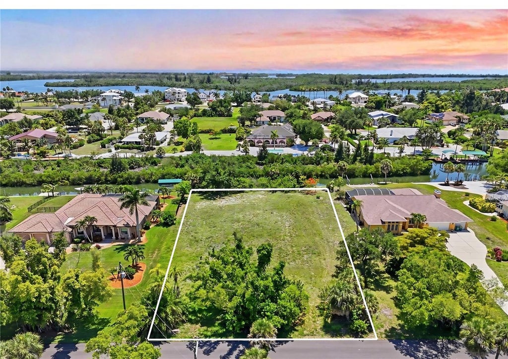 Photo of 305 Spaniards Road, Placida, FL 33946 (MLS # GC544229)