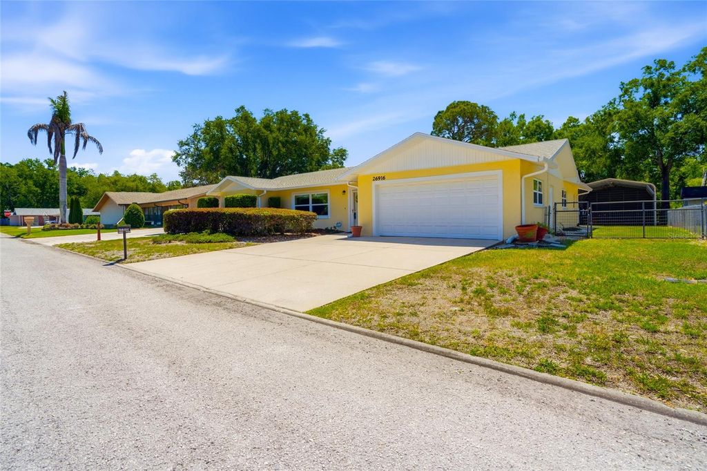 Photo of 26916 Magnolia Boulevard, Lutz, FL 33559 (MLS # TB8498153)