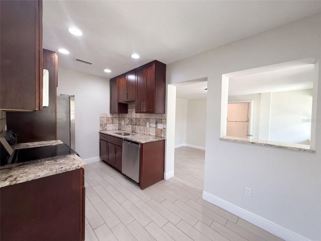 Photo of 1610 Stevensons Drive, Clearwater, FL 33755 (MLS # O6446023)