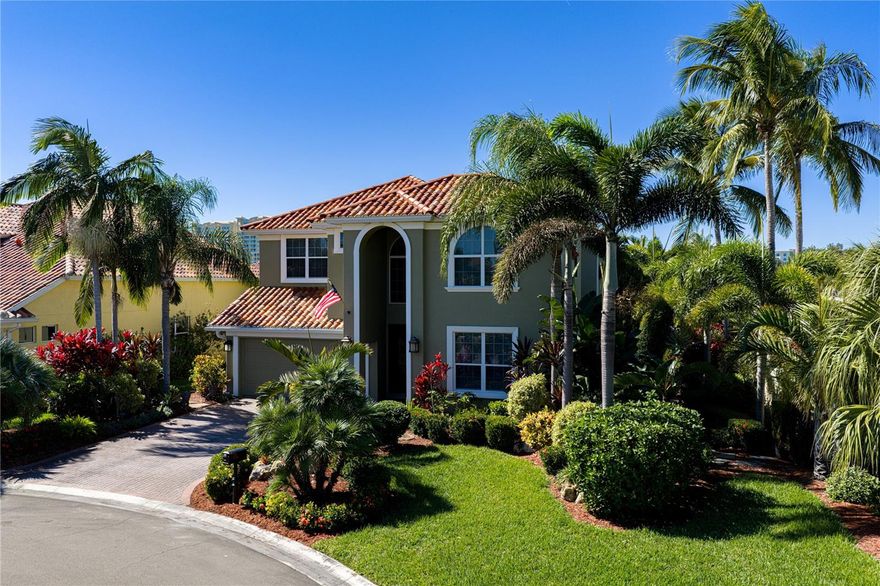 Includes a double-wide boat dock with a 40-foot slip and 15,000-lb electric lift, located just steps away at the private community marina—this exceptional home in Northshore at Riviera Dunes offers a rare opportunity to enjoy the boating lifestyle with deep-water access to the Gulf of America. Situated on a premium corner cul-de-sac lot—the largest in the subdivision, the residence overlooks a tranquil lake and provides scenic water views, privacy, and space rarely found in the community.

This 4-bedroom, 2.5-bath home features 2,842 sq. ft. of thoughtfully designed living space filled with natural light. Inside, soaring ceilings and a grand staircase create a welcoming entry. A versatile office or study includes a gas fireplace with Italian marble surround, while the main living level flows seamlessly from the formal dining room into the kitchen and spacious living area. Large sliding glass doors open to the screened lanai and backyard, perfectly framing the peaceful lake setting. The kitchen maintains its timeless design while offering updated stainless-steel appliances (2023–2024).

Upstairs, the primary suite offers a private retreat with lake views, a new glass-enclosed shower, and access to an upper patio deck. From the balcony, there are views toward the community marina, reinforcing the home’s connection to the water and boating lifestyle. The deck is enhanced by a 20' x 10' motorized retractable sunshade with wind sensor and integrated LED lighting (2024), ideal for relaxing in comfort throughout the day.

Interior upgrades include crown molding, engineered wood flooring, solid oak hardwood on the mezzanine, and newer carpeting. Outdoor living is equally impressive with a screened lanai, no-see-um-resistant screening (2025), and gloss-sealed brick driveway and walkways. The HOA provides a truly low-maintenance lifestyle, covering landscaping, annual mulching, and exterior painting, with the home freshly painted in 2024.

The private community marina, located on the same street and a short walk from the home, features deep-water access suitable for larger vessels and convenient guest docking. The included dock offers a double-wide slip, 15,000-lb powered lift (installed 2023), boarding stairs, and a dock box, making this an exceptional value for boating enthusiasts.

Residents enjoy resort-style amenities, including a heated pool, fitness center, tennis courts, pickleball, and year-round community social events. Conveniently located near golf courses, downtown Bradenton, Sarasota, and the Gulf beaches, this home delivers a rare blend of lakeside views, oversized lot, and walkable Gulf-access marina.

This is a standout opportunity to own one of the most desirable properties in Northshore at Riviera Dunes—where space, comfort, and boating convenience come together seamlessly.