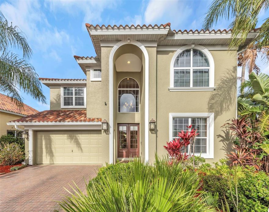 Includes a double-wide boat dock with a 40-foot slip and 15,000-lb electric lift, located just steps away at the private community marina—this exceptional home in Northshore at Riviera Dunes offers a rare opportunity to enjoy the boating lifestyle with deep-water access to the Gulf of America. Situated on a premium corner cul-de-sac lot—the largest in the subdivision, the residence overlooks a tranquil lake and provides scenic water views, privacy, and space rarely found in the community.

This 4-bedroom, 2.5-bath home features 2,842 sq. ft. of thoughtfully designed living space filled with natural light. Inside, soaring ceilings and a grand staircase create a welcoming entry. A versatile office or study includes a gas fireplace with Italian marble surround, while the main living level flows seamlessly from the formal dining room into the kitchen and spacious living area. Large sliding glass doors open to the screened lanai and backyard, perfectly framing the peaceful lake setting. The kitchen maintains its timeless design while offering updated stainless-steel appliances (2023–2024).

Upstairs, the primary suite offers a private retreat with lake views, a new glass-enclosed shower, and access to an upper patio deck. From the balcony, there are views toward the community marina, reinforcing the home’s connection to the water and boating lifestyle. The deck is enhanced by a 20' x 10' motorized retractable sunshade with wind sensor and integrated LED lighting (2024), ideal for relaxing in comfort throughout the day.

Interior upgrades include crown molding, engineered wood flooring, solid oak hardwood on the mezzanine, and newer carpeting. Outdoor living is equally impressive with a screened lanai, no-see-um-resistant screening (2025), and gloss-sealed brick driveway and walkways. The HOA provides a truly low-maintenance lifestyle, covering landscaping, annual mulching, and exterior painting, with the home freshly painted in 2024.

The private community marina, located on the same street and a short walk from the home, features deep-water access suitable for larger vessels and convenient guest docking. The included dock offers a double-wide slip, 15,000-lb powered lift (installed 2023), boarding stairs, and a dock box, making this an exceptional value for boating enthusiasts.

Residents enjoy resort-style amenities, including a heated pool, fitness center, tennis courts, pickleball, and year-round community social events. Conveniently located near golf courses, downtown Bradenton, Sarasota, and the Gulf beaches, this home delivers a rare blend of lakeside views, oversized lot, and walkable Gulf-access marina.

This is a standout opportunity to own one of the most desirable properties in Northshore at Riviera Dunes—where space, comfort, and boating convenience come together seamlessly.