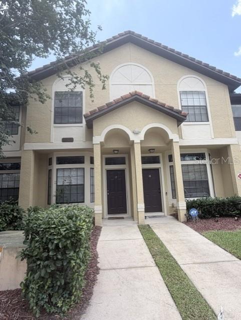 Photo of 6013 Scotchwood Glen #17, Orlando, FL 32822 (MLS # S5152707)