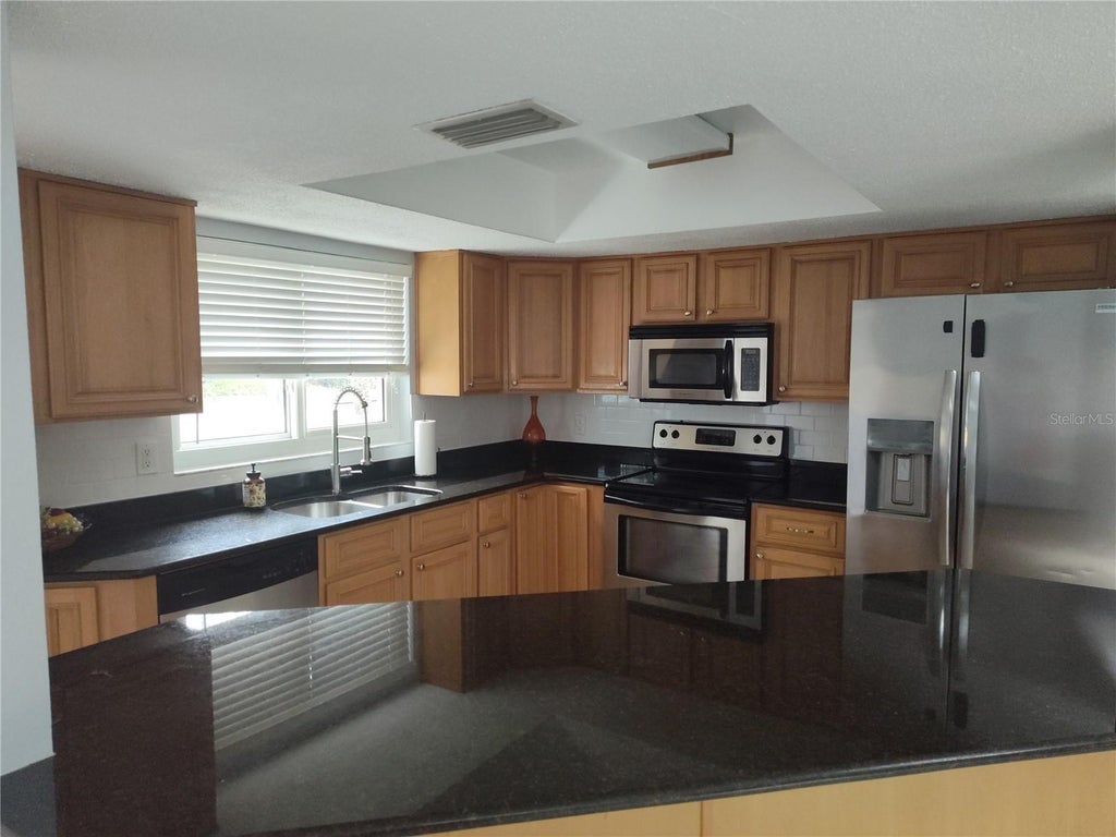 Photo of 1818 Lillian Avenue, Tarpon Springs, FL 34689 (MLS # TB8542088)