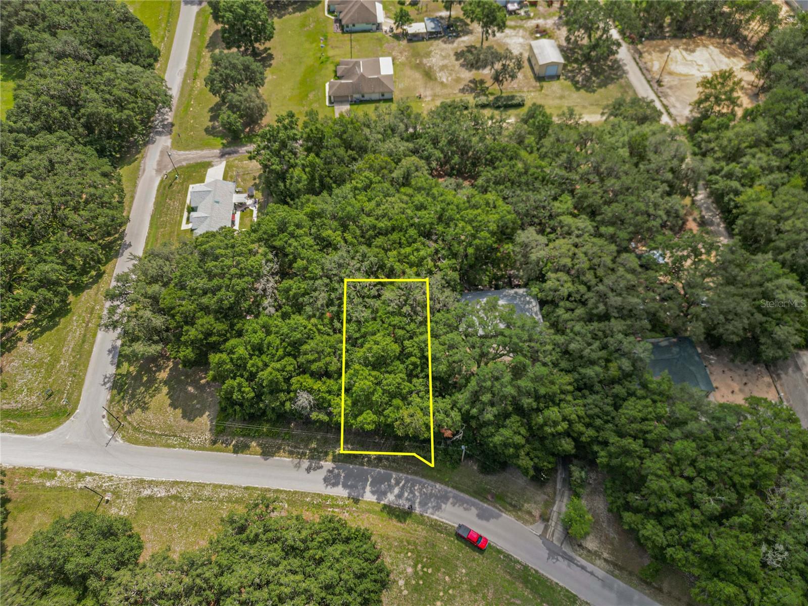 Build your dream home on this beautiful .29-acre lot in the sought-after community of Rolling Ranch Estates, known for its peaceful, rural charm and welcoming neighbors. Enjoy the tranquility of country living while still being close to everything you need. This homesite offers easy access to Rolling Ranch Park, featuring picnic areas, playgrounds, walking trails, and sports courts. Just minutes from KP Hole Park and the Rainbow River, you can enjoy tubing, kayaking, paddleboarding, and swimming in crystal-clear waters. Rainbow Springs State Park is minutes away for hiking and wildlife viewing, with unique shops and waterfront dining nearby. Conveniently located near shopping, dining, and medical facilities in both Dunnellon and Ocala—plus quick access to Ocala’s renowned equestrian venues—this lot offers the perfect blend of community, nature, recreation, and convenience, all with no HOA.