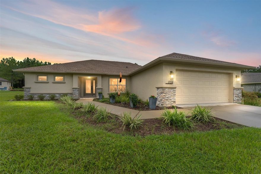 A rare offering in Bellmont Hills—this custom residence, completed in 2023, blends modern design with the serenity of a private 1.01-acre setting. The home’s open and inviting layout highlights designer finishes, a well-appointed kitchen, and a tranquil primary suite. Expansive glass doors invite natural light and open to a screened lanai, perfect for entertaining or enjoying peaceful views of the property. As part of Bellmont Hills, homeowners also enjoy exclusive privileges at Citrus Hills Golf & Country Club, renowned for its championship golf, premier fitness facilities, fine dining, and social lifestyle. A truly elevated opportunity in the heart of Inverness.