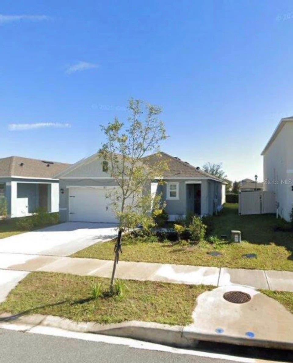 Photo of 1815 Post Oak Dr, Davenport, FL 33837 (MLS # S5159887)