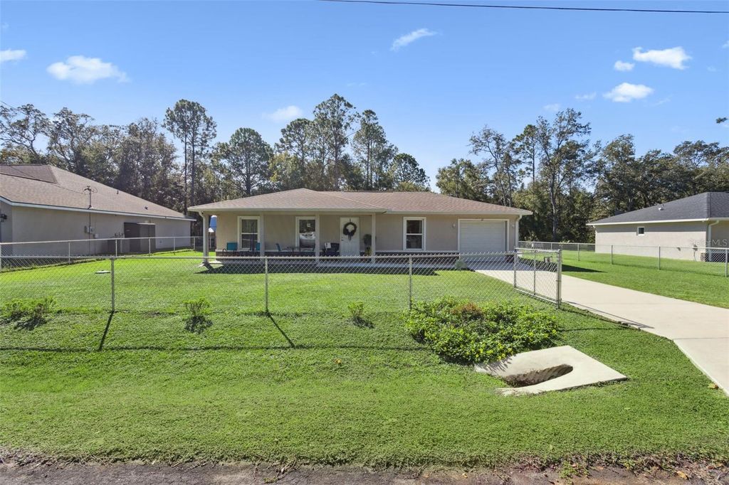 Photo of 61 Guava Trail, Ocklawaha, FL 32179 (MLS # O6360099)