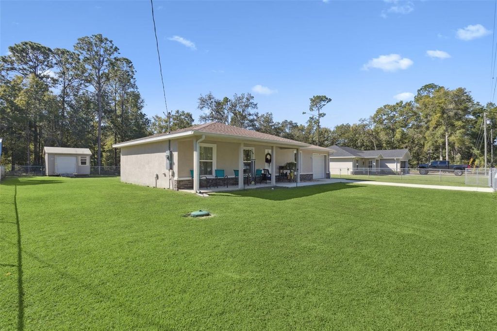 Photo of 61 Guava Trail, Ocklawaha, FL 32179 (MLS # O6360099)