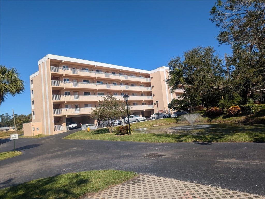 Photo of 9510 Harbor Greens Way #406, Seminole, FL 33776 (MLS # TB8404105)