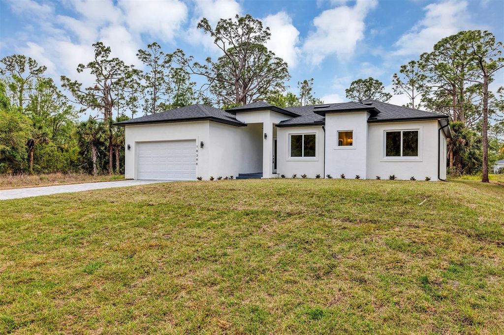 Photo of 18399 Hillsborough Boulevard, Port Charlotte, FL 33954 (MLS # O6368862)