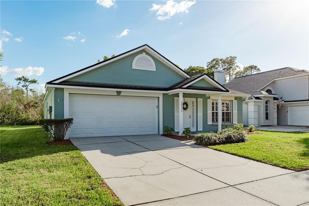 Photo of 28540 Tall Grass Drive, Wesley Chapel, FL 33543 (MLS # TB8475799)