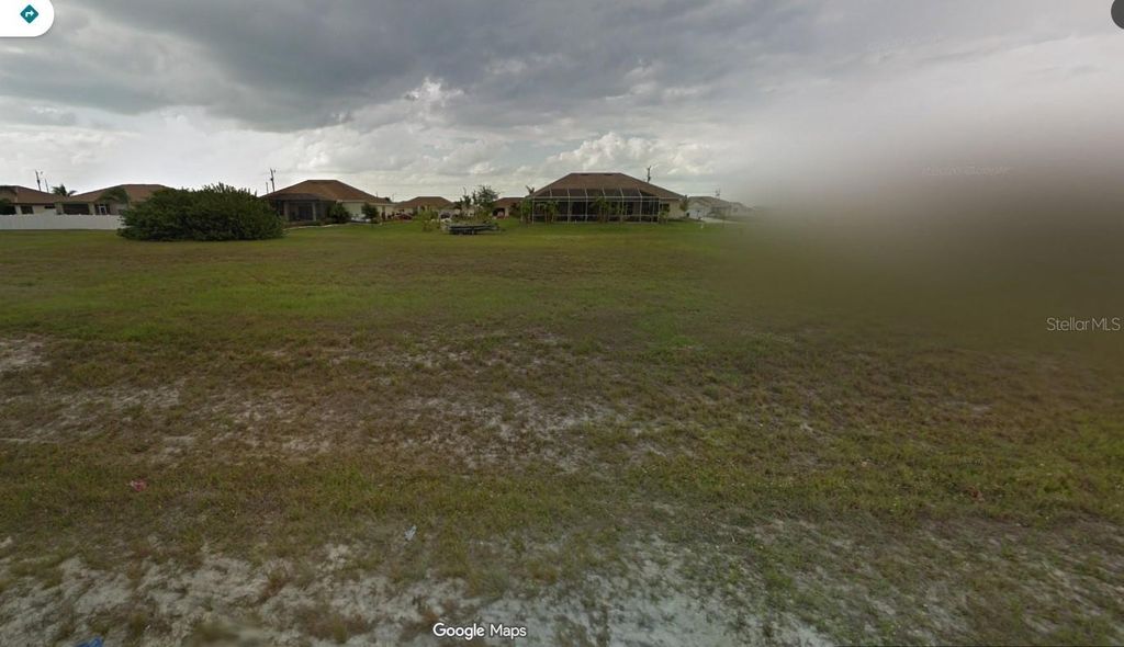 Photo of 2211 Embers Parkway W, Cape Coral, FL 33993 (MLS # O6361918)