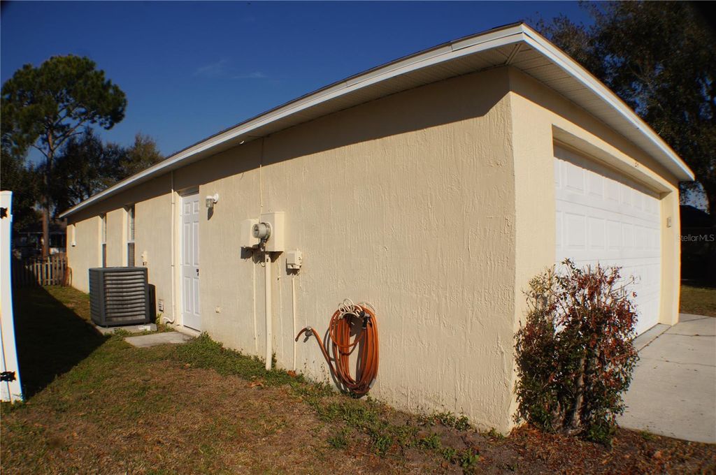 Photo of 214 Eagle Point Loop, Auburndale, FL 33823 (MLS # S5142239)