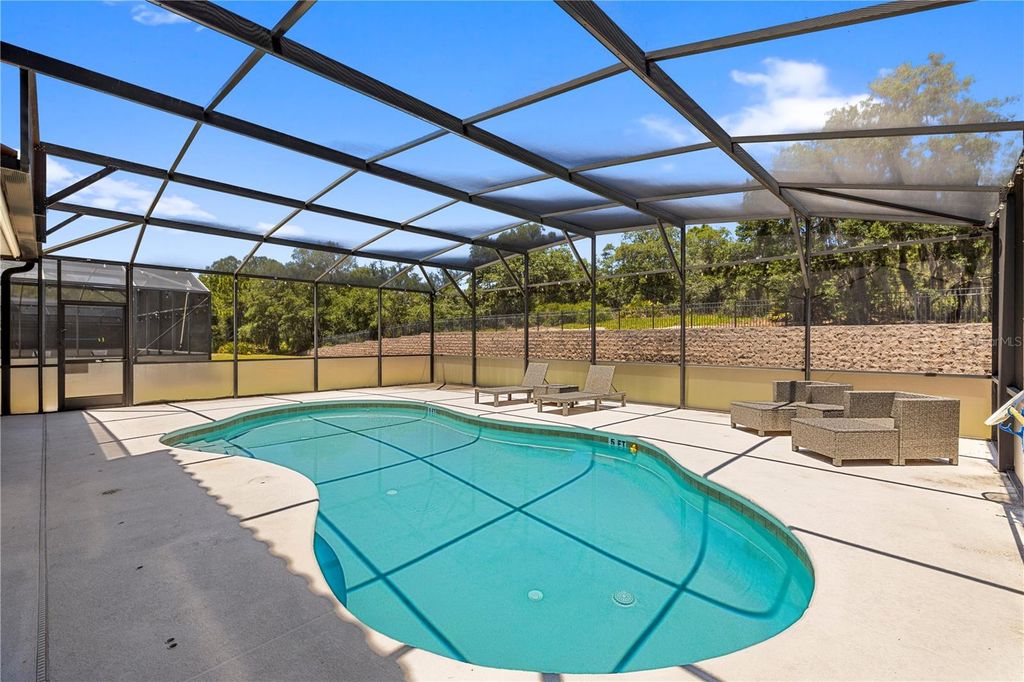 Photo of 436 Orange Cosmos Boulevard, Davenport, FL 33837 (MLS # TB8507217)