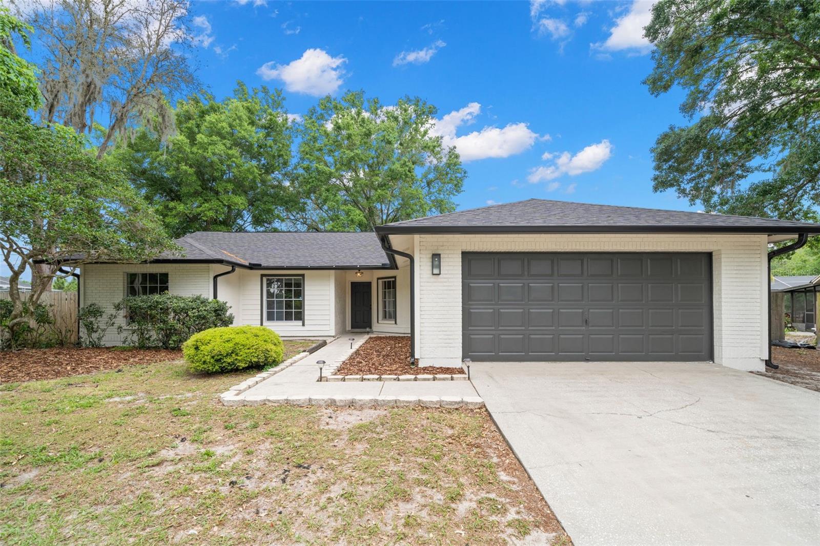 NO HOA/CDD! NEW ROOF, GUTTERS, AND EXTERIOR PAINT ON AN OVERSIZED LOT. Amazing location, nestled in the heart of Lutz!!! Under 15 minutes to get to anything you need such as the Tampa Premium Outlets, Target, Walmart, and all your major supermarkets. Very easy and convenient to access Interstate 275, Interstate 75, and Veterans Expressway, each also accessible in under 15 minutes. If you have a little one, you're walking distance to Maniscalco Elementary. The inside HVAC handler was replaced in 2019. This property sits on a large lot where you can enjoy BBQs and the outdoors in the covered patio, overlooking the large oversized backyard. Don't miss the opportunity to live in this cozy house.