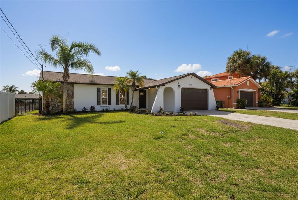 Photo of 13840 Barnard Avenue, Hudson, FL 34667 (MLS # TB8510411)