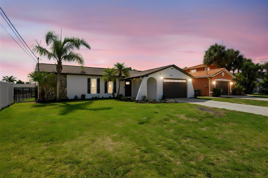 Photo of 13840 Barnard Avenue, Hudson, FL 34667 (MLS # TB8510411)