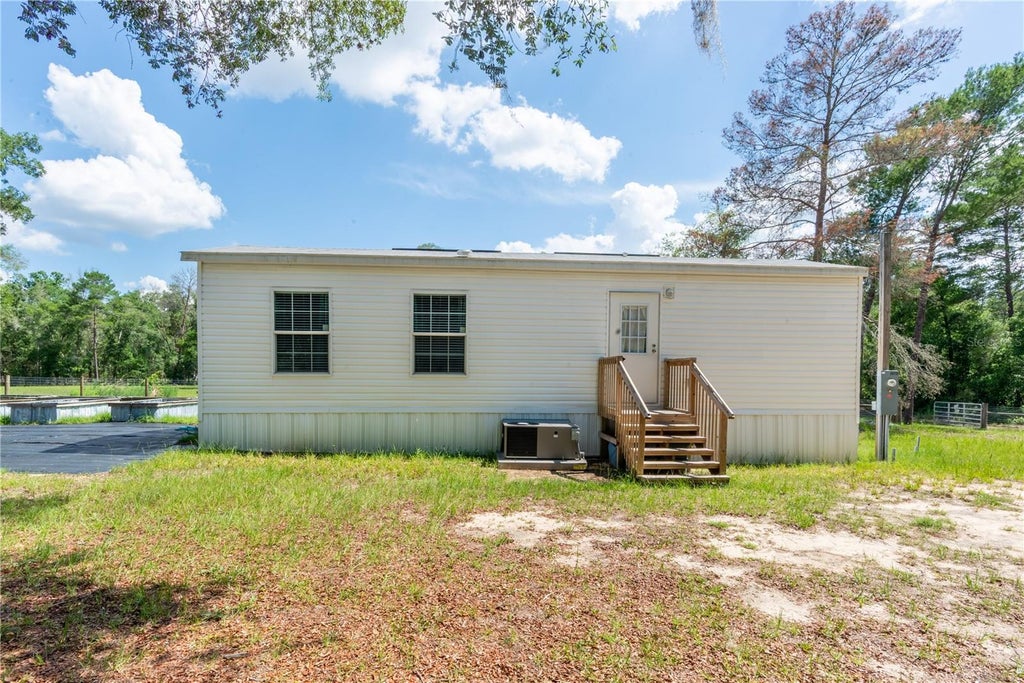 Photo of 26721 Chippewa Trail, Brooksville, FL 34601 (MLS # O6409285)