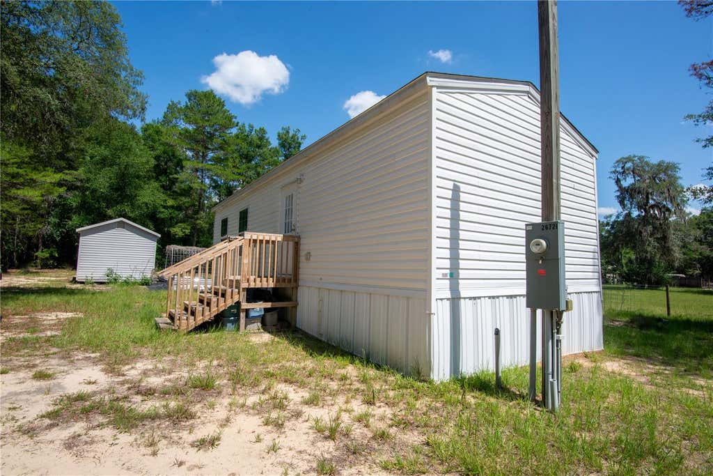 Photo of 26721 Chippewa Trail, Brooksville, FL 34601 (MLS # O6409285)