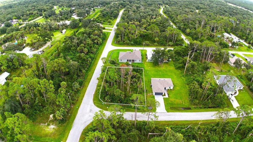 Prime North Port Lot: Build Your Florida Dream Home. Discover this exceptional, oversized corner lot in the heart of North Port, a community known for its natural beauty, estate homes and growing amenities. Nestled just west of Sumter Boulevard and south of North Port Estates, this lot provides a perfect blend of quiet living and convenient access. With approximately 125 feet of frontage on Gadboys Avenue and 90 feet on Hackley Road, this property offers ample space for a spacious new home and outdoor living area. The surrounding streets are lined with mature trees, creating a peaceful atmosphere. This isn't just a lot; it's a gateway to the best of Southwest Florida. You'll be just a few minutes from the North Port Aquatic Center, the Morgan Family Community Center, and the Performing Arts Center at North Port High. Two miles away, explore the Myakkahatchee Creek Environmental Park.  Check out the Legacy Trail. Enjoy easy drives to shopping, dining, and a variety of community activities. For outdoor enthusiasts, the area is a paradise. Explore the Legacy Trail, one of the region's premier nature trails, or take a short trip to the stunning Gulf beaches of Venice, Englewood, and Boca Grande. Sports fans will love the proximity to CoolToday Park, the spring training home of the Atlanta Braves.  Ideal lifestyle with year round enjoyment of golf, swimming, fishing and boating. Come see this beautiful lot and envision your future home in one of Florida's most desirable cities. It's the perfect place to build the life you've been dreaming of.
