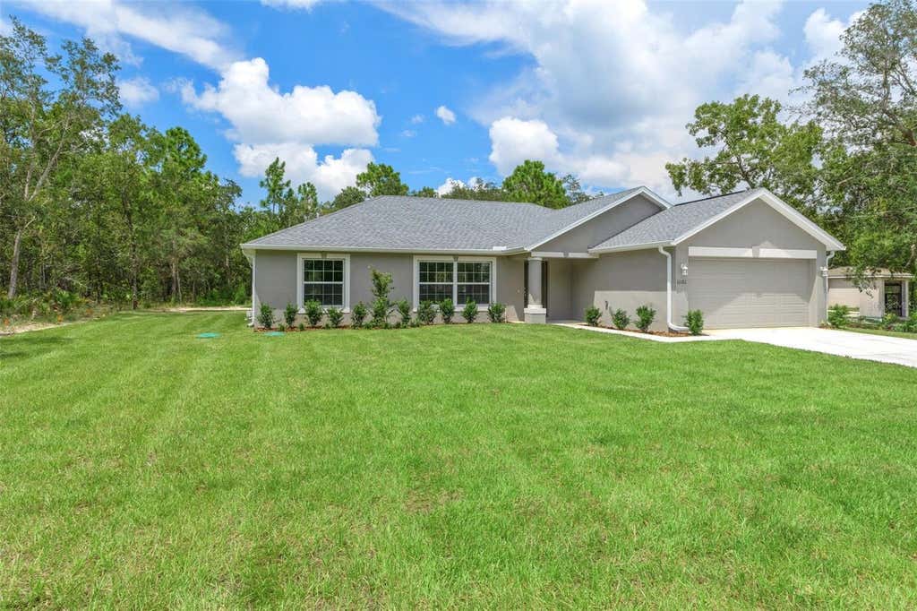 Photo of 16375 Kakawi Road, Brooksville, FL 34614 (MLS # W7885870)