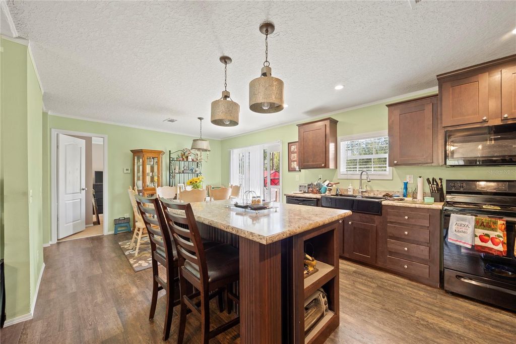 Photo of 221 Magnolia Road, Hawthorne, FL 32640 (MLS # GC539632)