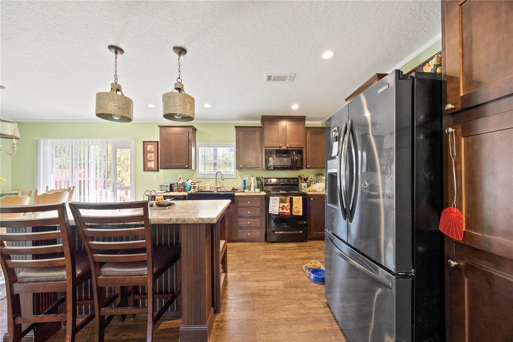 Photo of 221 Magnolia Road, Hawthorne, FL 32640 (MLS # GC539632)