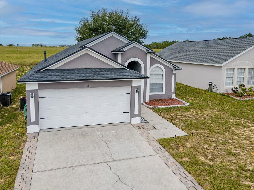 Photo of 721 Rollins Drive, Davenport, FL 33837 (MLS # O6359304)