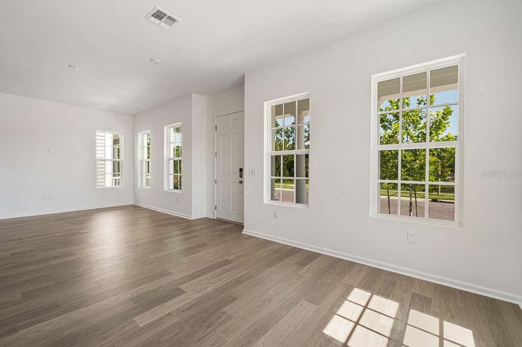 Photo of 1833 Headland Loop, Kissimmee, FL 34747 (MLS # O6431424)