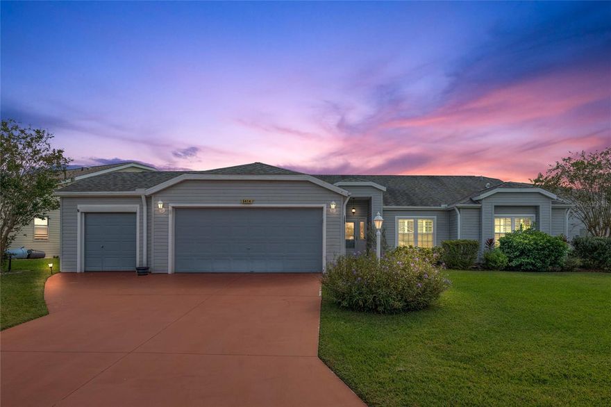 This 2,027-square-foot home is brimming with charm and offers a blend of spaciousness, comfort and flexibility.  Located at the popular, Plantation at Leesburg, a 55+ community. The split floor plan ensures privacy and convenience for the occupants, while the thoughtful design and recent upgrades make it a truly inviting space. The home boasts a tasteful exterior and lot position. It offers an oversized 2 car garage with a full-length golf cart garage providing ample parking space and storage. ***ROOF 2023 with SOLAR PANELS**AC 2021** WATER HEATER  2021** DOUBLE PANE WINDOWS 2020*** All ensuring peace of mind, energy efficiency and great for your home insurance.  LOW UTILITIES, YES PLEASE! The main living area is generously sized, allowing for various furniture arrangements and offering a cozy atmosphere. The kitchen is a focal point, with elegant granite countertops that provide ample space for meal preparation and dining. The split floor plan places the bedrooms on opposite sides of the house, ensuring privacy for both the owners and any guests. The bedrooms are generously sized, offering plenty of space and natural light. The owner's suite is a true retreat with two walk-in closets, an ensuite bathroom, with dual sinks, walk-in shower, and walk-in tub making mornings a breeze.  An enclosed lanai adds extra square footage to the living space and provides an excellent spot for relaxation and entertainment. A screened-in porch at the back of the home is a perfect place to enjoy the outdoors while being protected from insects and the elements. all of these thoughtful features make this home a truly inviting and functional space for its lucky occupants. The community offers two full size golf courses, 3 clubhouses; all with heated pools, tennis, pickleball, pool tables, darts and a huge list of activities each and every month that will keep you moving and having fun.  You can enjoy a good game of softball and hotdogs at the pavilion on game day.  Whether it is bocce ball, shuffleboard, or horseshoes, you will never run out of things to do at the Plantation.  The life you have waited your whole life for is just minutes away from major hospitals and shopping. Easy access to the parks and airport.  Call today for your personal tour!