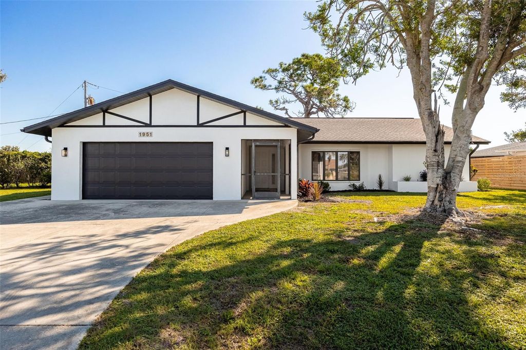 Photo of 1951 Greenlawn Drive, Englewood, FL 34223 (MLS # A4662938)