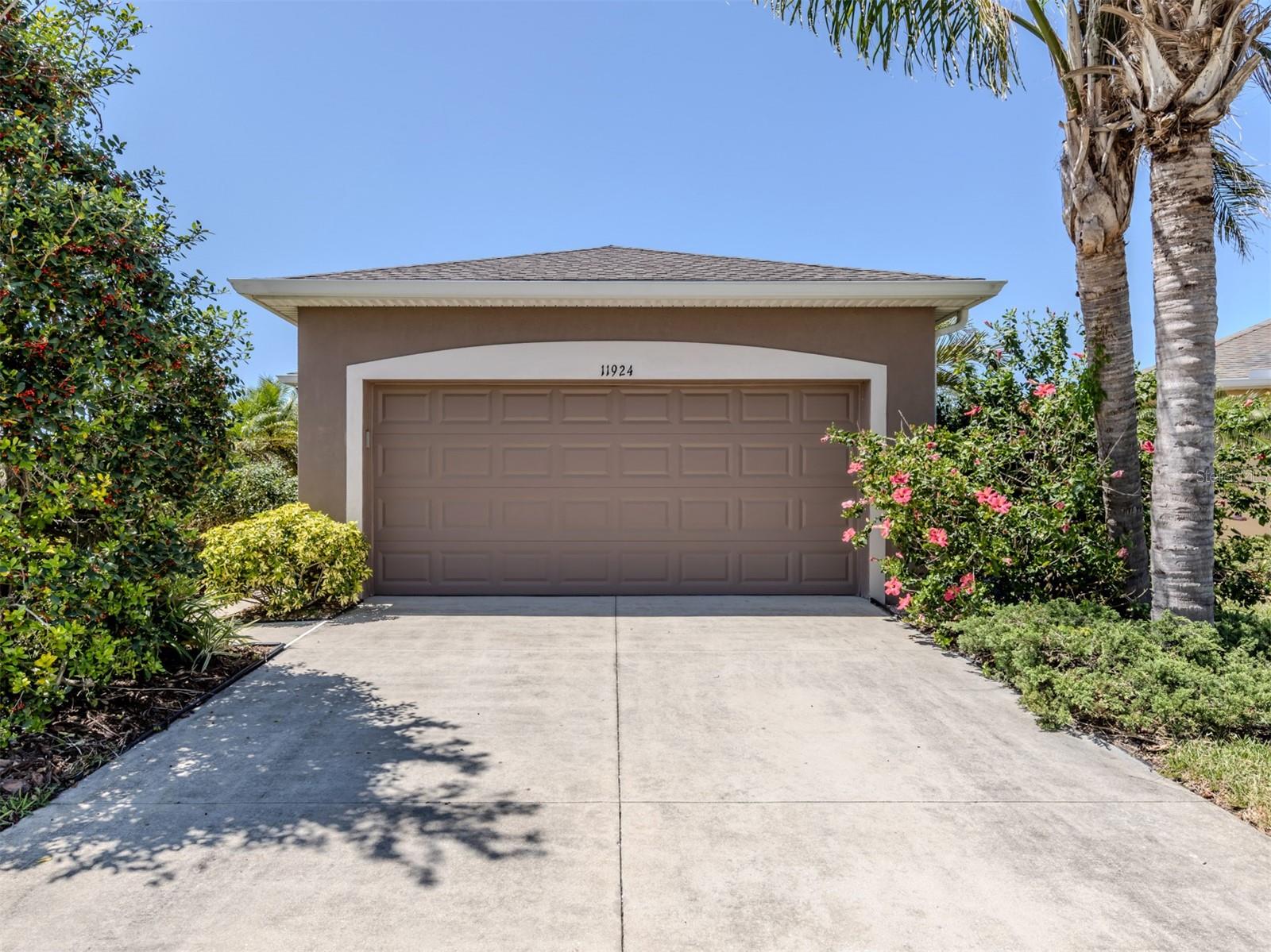Stunning single-family home in exclusive gated community with water view! This immaculate three-bedroom, two-bath, two-car garage, original owner home sits on an oversized lot, offering extra privacy and breathtaking views of the water and your Florida sunsets. In a sought-after gated community, this residence features a spacious, oversized screened-in lanai with vinyl windows, providing year-round enjoyment of your outdoor space. The exterior deck, overlooking the large lake, is a spot to relax or entertain while enjoying the serene water views. Inside, you'll find beautiful laminate flooring throughout the entire home creating a seamless flow. The bright and airy interior is complemented by a well-appointed kitchen with under-cabinet lighting and granite countertops, and spacious living areas. The home also includes a full interior laundry room with a new washer and dryer (2024). The primary en suite with a large walk-in closet and dual sinks with shower is toward the rear of the home with the additional two beds and shared bath toward the front allowing privacy for guests and owners alike. Pride of ownership shines through with many updates throughout such as a premier builder package when built, new air conditioner (2018) and fresh exterior paint (2023). This home has been treasured as a seasonal retreat and has never been rented equating to being occupied for less than five years. This home is being offered turnkey furnished. Enjoy peace of mind with a guard gate and the added benefit of a new roof installed in 2023 with a transferrable warranty, hurricane shutters and in-home security system. Stoneybrook of Venice hosts numerous community events including food truck days, exercise classes, outdoor concerts, pickup sports, holiday fireworks and more. Community features include a state-of-the-art fitness center, trails, nature preserves, baseball and soccer fields, pickleball and tennis courts, basketball courts, hockey rink, beach volleyball, community pool with clubhouse, splash pad and playground areas. Stoneybrook is eight miles from gulf beaches and Sarasota County's top-rated public and private schools. HOA fee includes cable television, staffed guard gate, and water for the outside sprinkler and irrigation system. Schedule your private showing today. With so much to offer, this home is a blend of comfort, luxury and convenience. Don’t miss the opportunity to make this beautiful property yours. Schedule your private showing today.