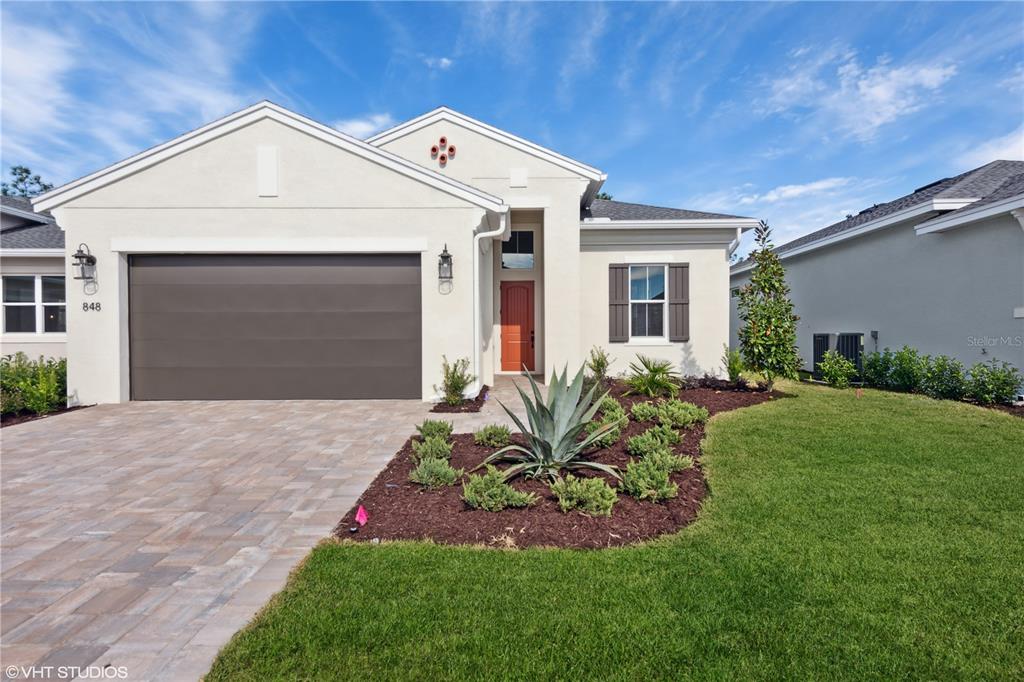 **NEW CONSTRUCTION AVAILABLE NOW** This stunning 2 Bedroom home features lots of beautiful upgrades and provides a Kitchen-front layout that highlights the open concept of the Dining and Great Room. The beautifully upgraded Kitchen features white quartz countertops, decorative backsplash, white cabinetry with crown molding, and upgraded stainless steel appliances, including a built-in cooktop and wall oven. Windows from the Kitchen to the Great Room fill the home with natural light, and all main living areas feature laminate wood plank flooring. Owner's Suite highlights include a location tucked off the Great Room, separate dual vanities, oversized shower with frameless enclosure, and large walk-in closet.