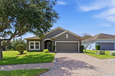 Photo of 133 Lakeshore Drive, Davenport, FL 33837 (MLS # O6405861)