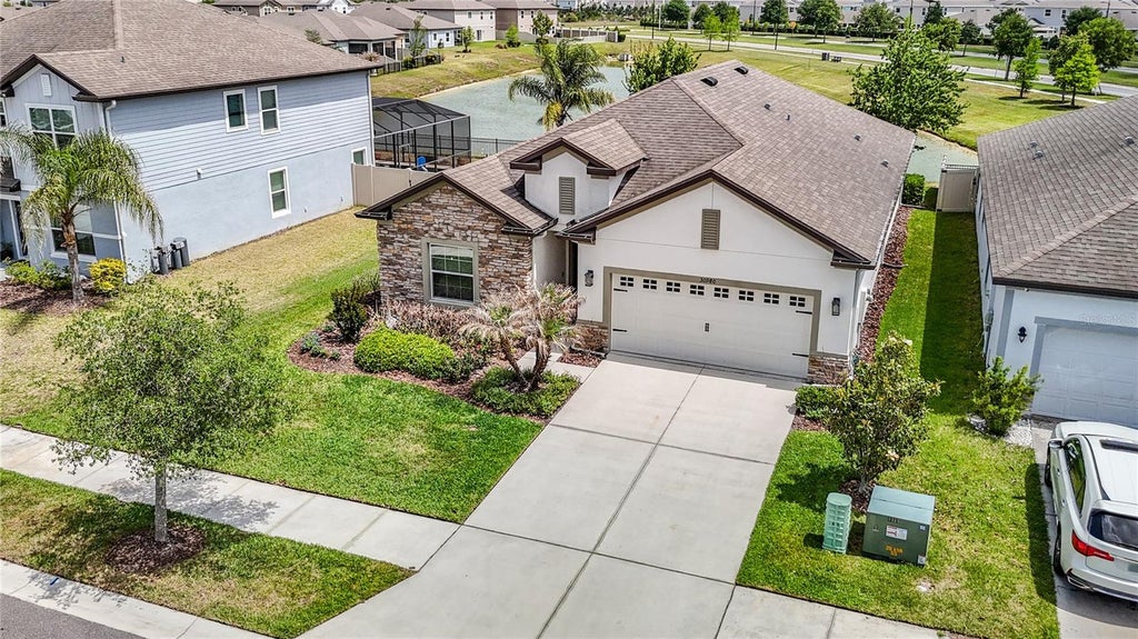Photo of 30980 Jazz Leaf Place, San Antonio, FL 33576 (MLS # TB8499780)