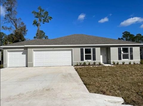 Photo of 25 Round Thorn Drive, Palm Coast, FL 32164 (MLS # C7507878)