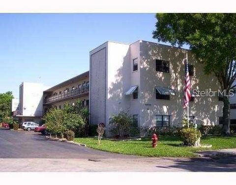 Photo of 5975 Terrace Park Drive N #202, St Petersburg, FL 33709 (MLS # TB8424284)