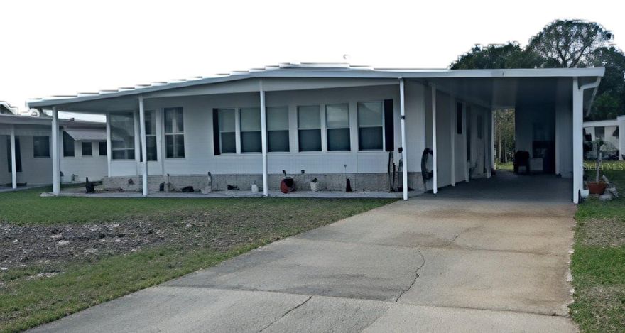 55+ community.  Desirable community with indoor and outdoor pools, a spacious clubhouse hosting frequent social events. The home offers 2 bedrooms, 2 baths, walk-in closets, a large living room with bay windows, a big Florida room, and a carport with a new roof.
