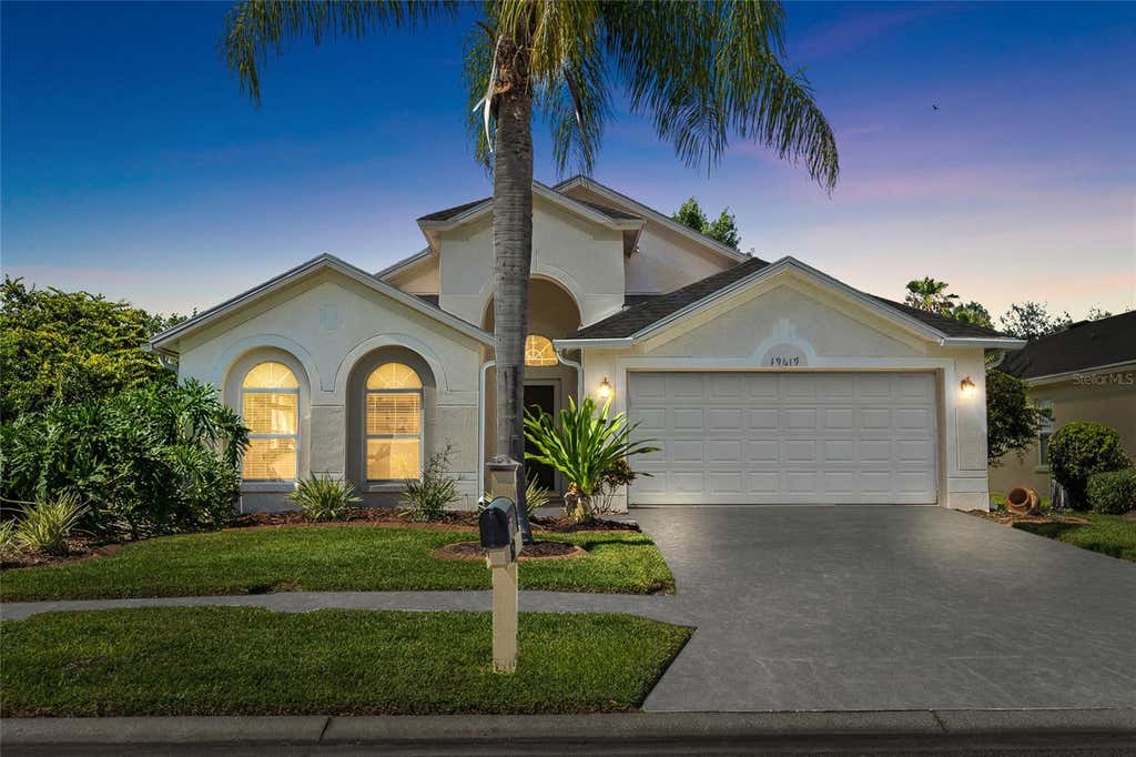 Photo of 19619 Bergenfeld Drive, Land O Lakes, FL 34638 (MLS # TB8520377)