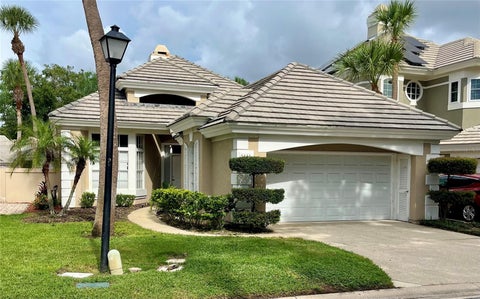 Photo of 8444 Foxworth Circle #48, Orlando, FL 32819 (MLS # O6431907)