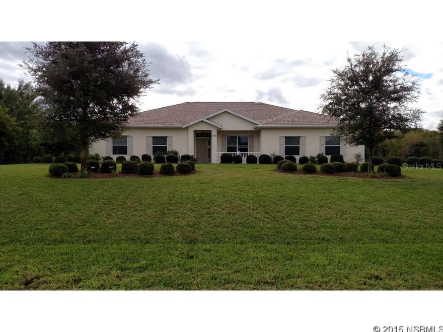 Under contract taking backups. Great floor plan; 4 bedroom 3 bath 2340 sq. ft. concrete block/stucco home with 2784 sq. ft. hangar/shop on paved taxiway at Massey Ranch Airpark.  Split plan is open and airy, has 9'4" ceilings, one-coat plastered walls and ceiling fans throughout.  Nice kitchen with GE stainless steel appliances, gas range, electric convection oven and over the range convection/microwave, premium honey maple cabinets, dining nook and formal dining room.  The master bedroom, guest suite/office and family room all open on to large screened back porch.  The master bath has separate toilet room, double sinks, large shower with dual shower heads and jetted tub.  Gas water heater services master bath and kitchen.  Electric water heater services the two other bathrooms, water heaters can be cross fed if needed.  Floors are tile and carpet.   Laundry room, water softener, high efficiency heat pump, city water, septic LP gas, cable and satellite.  The house and hangar have a security system, cutter drainage system, hurricane shutters and both are wired for a generator.  Hangar: Steel and lumber construction with concrete board /stucco siding 40' x 56' Hangar has two 40X 12 electric bi-fold doors.  36'6 X 11'6 garage area has 9ft wide door, a bathroom with shower and utility sink.  The hangar has a metal roof and three RV hook ups on the outside, Direct access to paved taxiway and 4360' paved lighted runway.   The East Coast Regional Rail Trial (multi-use trail) is .6 miles from the house. ;Water: City