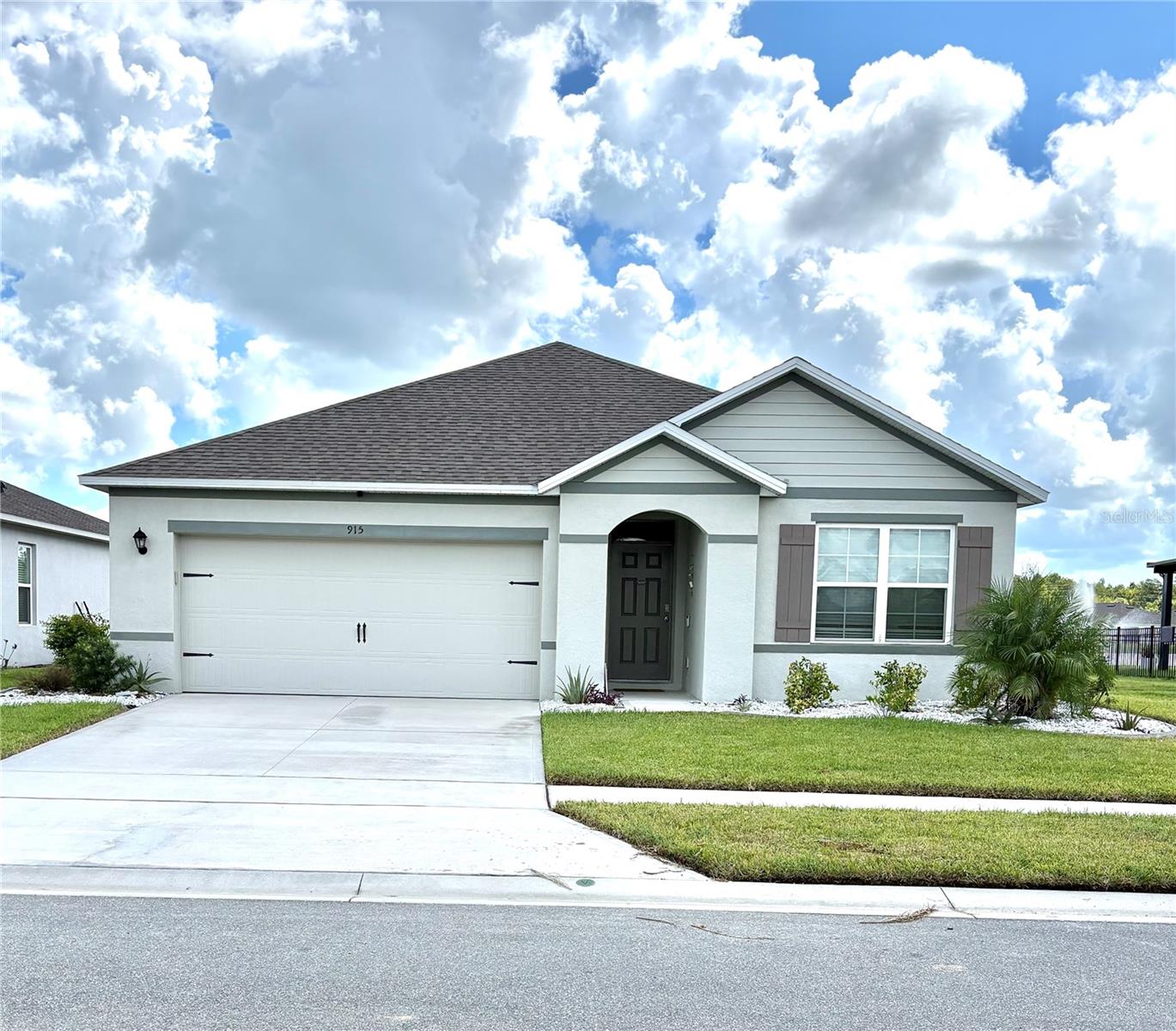 2022 Lakefront Home in the welcoming community of Coastal Woods, this nearly new 3/2/2 open concept SMART home is move in ready. The large kitchen island creates a gathering space to enjoy entertaining and flows into a separate dining area and large living room. The spacious master offers a walk in closet, ensuite with a private water closet, the split floor plan offers privacy and the 2 additional bedrooms share a center bath. Relax on your screened patio looking at the beautiful waterfront view and serene lake fountain, the fenced yard provides security for children and pets. Coastal Woods features a community pool, pickle ball courts and a children’s playground, the sidewalks allow for pleasant long walks throughout the community.
Upgrades include, fenced yard, screened patio & additional uncovered patio area, stamped curbing, 2 security cameras, nest doorbell, window treatments.